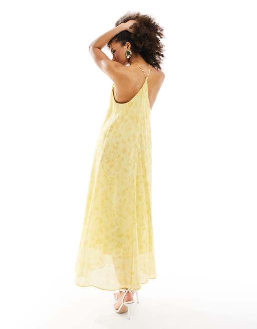 & Other Stories - Vestito con gonna al polpaccio accollato giallo con cut-out sul retro e stampa a fiori