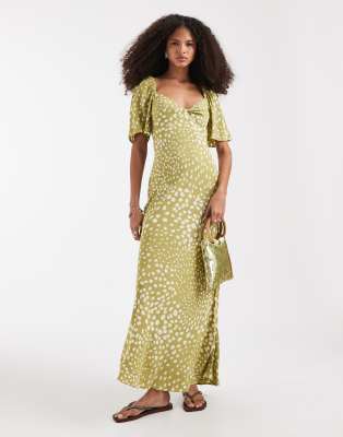& Other Stories viscose puff sleeve midaxi dress with twist sweetheart  neckline in green polka dot | ASOS