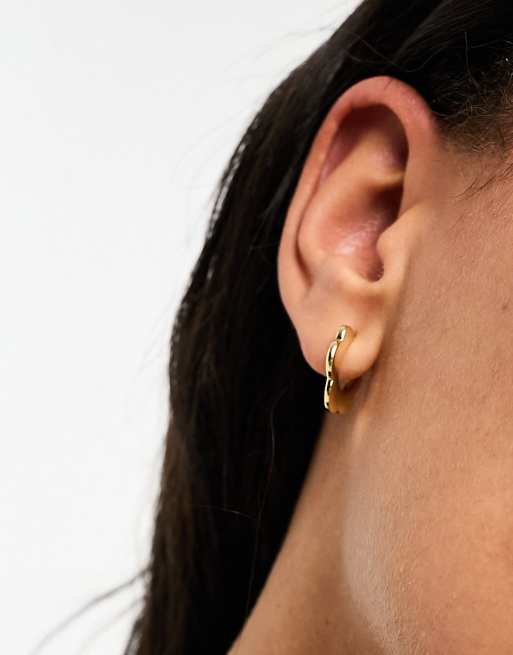 Wavy gold on sale hoop earrings