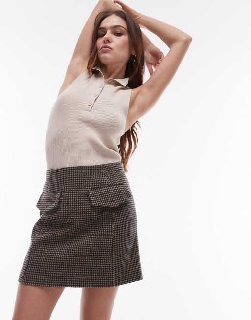 & Other Stories wool blend mini skirt with flap front pockets in black and brown check pattern