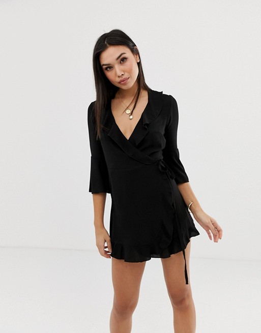 Outrageous Fortune ruffle wrap dress with fluted sleeve in black