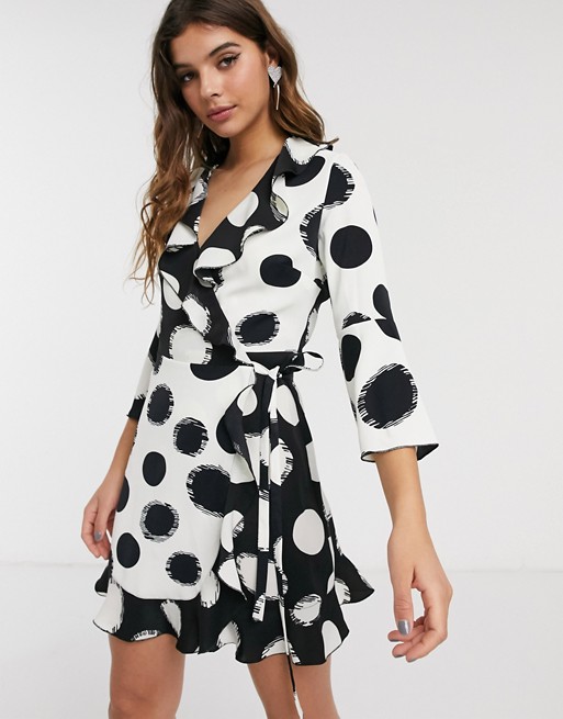 Outrageous Fortune ruffle wrap dress with fluted sleeve in contrast overscale polka