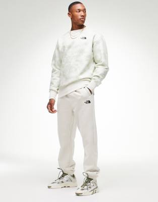 Брюки и меггинсы Oversized-джоггеры кремового цвета The North Face Essential эксклюзивно для ASOS-Белый