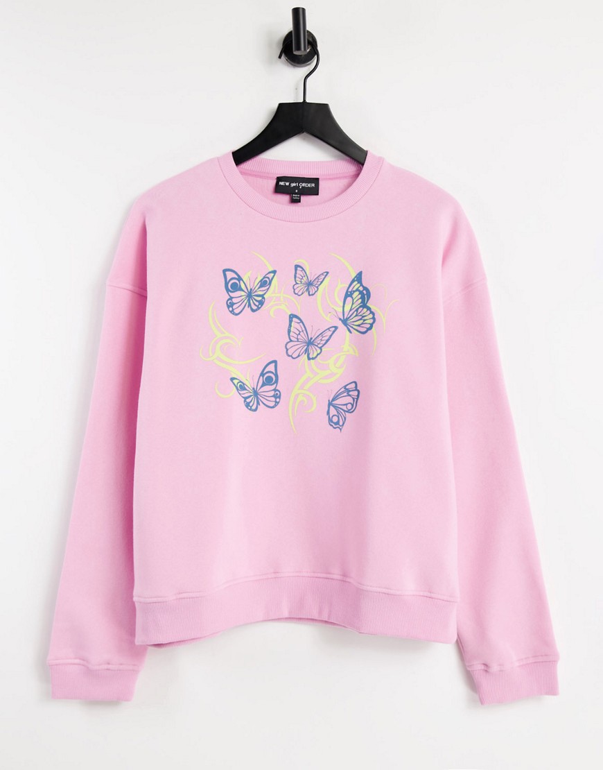 фото Oversized-свитшот с принтом бабочек new girl order-розовый цвет