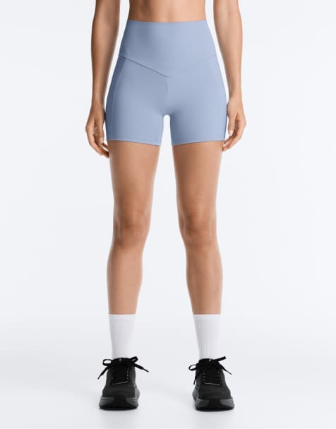 OYSHO 10 cm kompressions-hotpants med lomme og højtaljet pasform i blå - view 1