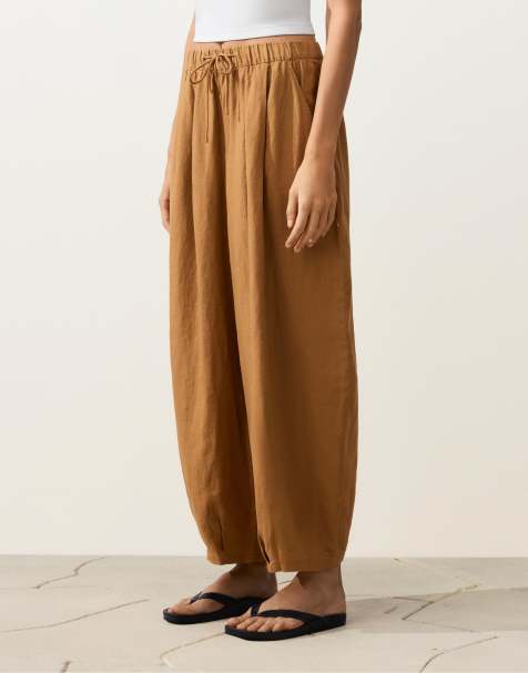 OYSHO 100% linen pleated balloon trousers in mustard - view 1