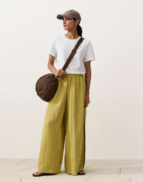 OYSHO 100% linen wide-leg trousers with side pleat in lime green - view 1