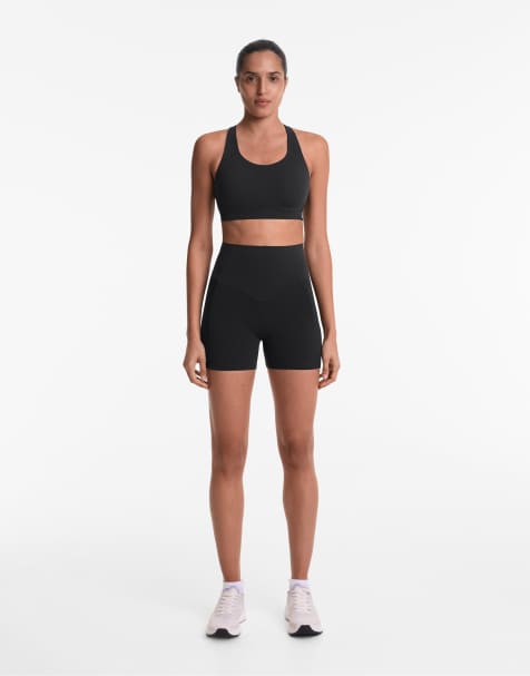 OYSHO 10cm compressive pocket high rise hot pants in black - view 1