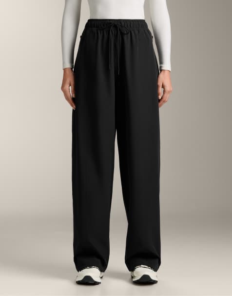 OYSHO 10k waterproof straight-leg trousers in black - view 1