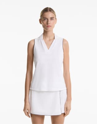 Oysho - Ärmelloses Polohemd aus Jacquard in gebrochenem Weiß