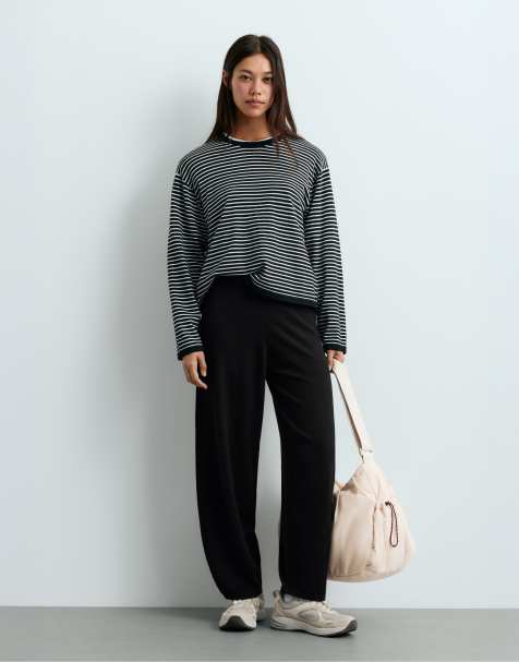 OYSHO Balloon fluid-knit trousers in black - view 1