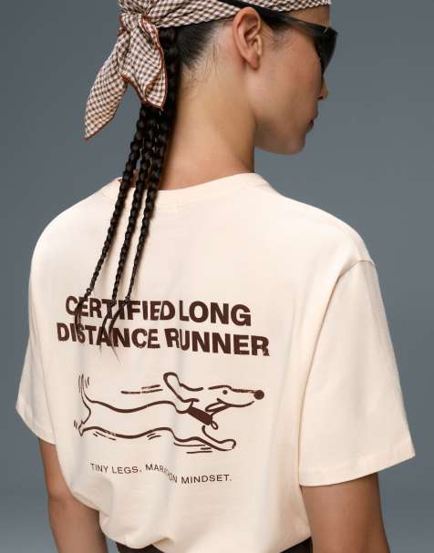 OYSHO boxy T-shirt i bomuldsblanding med korte ærmer og print i ivory ecru - view 1