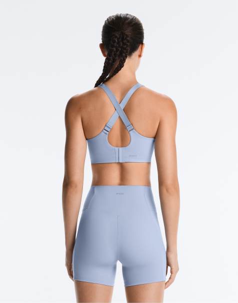 OYSHO - Brassière de sport de maintien élevé à effet compressif et dos croisé - Bleu - view 1