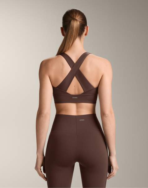 OYSHO - Brassière de sport maintien intermédiaire en tissu léger à bretelles croisées dans le dos - Marron foncé - view 1