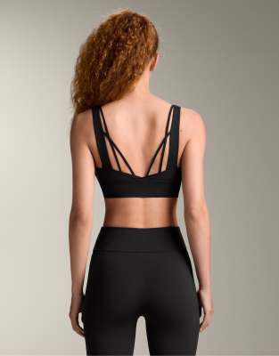 Oysho - Brassière de sport maintien intermédiaire en tissu léger - Noir