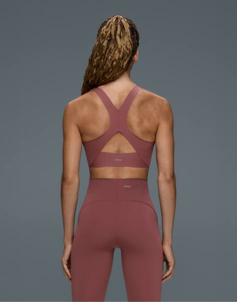 OYSHO brassière sportiva compressiva a supporto medio con schiena incrociata rosa - view 1