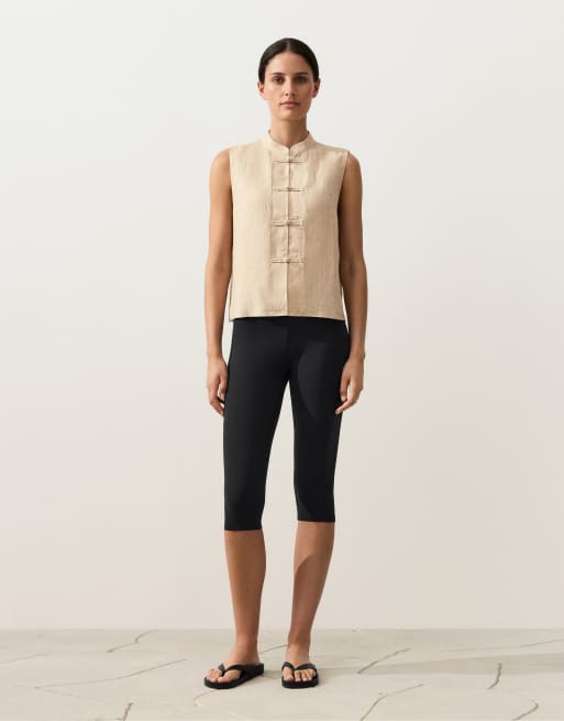 OYSHO - Camicia senza maniche 100% lino con colletto alto e bottoni color sabbia, 2 di 4