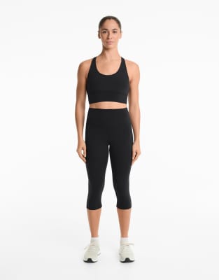Oysho - Capri-Leggings aus Comfortlux in Schwarz mit hohem Bund, 40 cm