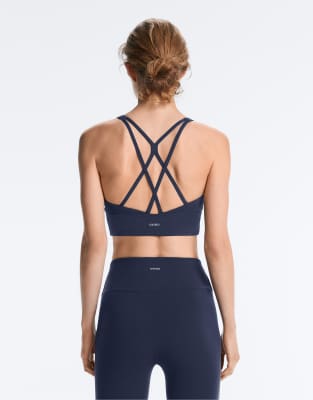 OYSHO - Comfortlux - Brassière de sport à maintien modéré avec bonnets - Bleu marine