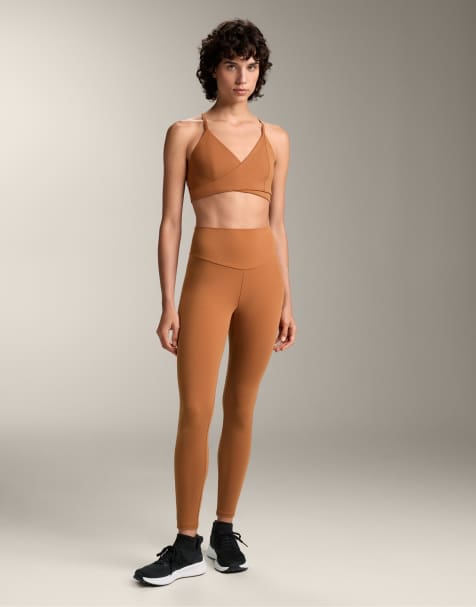 OYSHO – Comfortlux – Crossover-Sport-BH in dunklem Orange mit mittlerer Stützfunktion und Körbchen - view 1