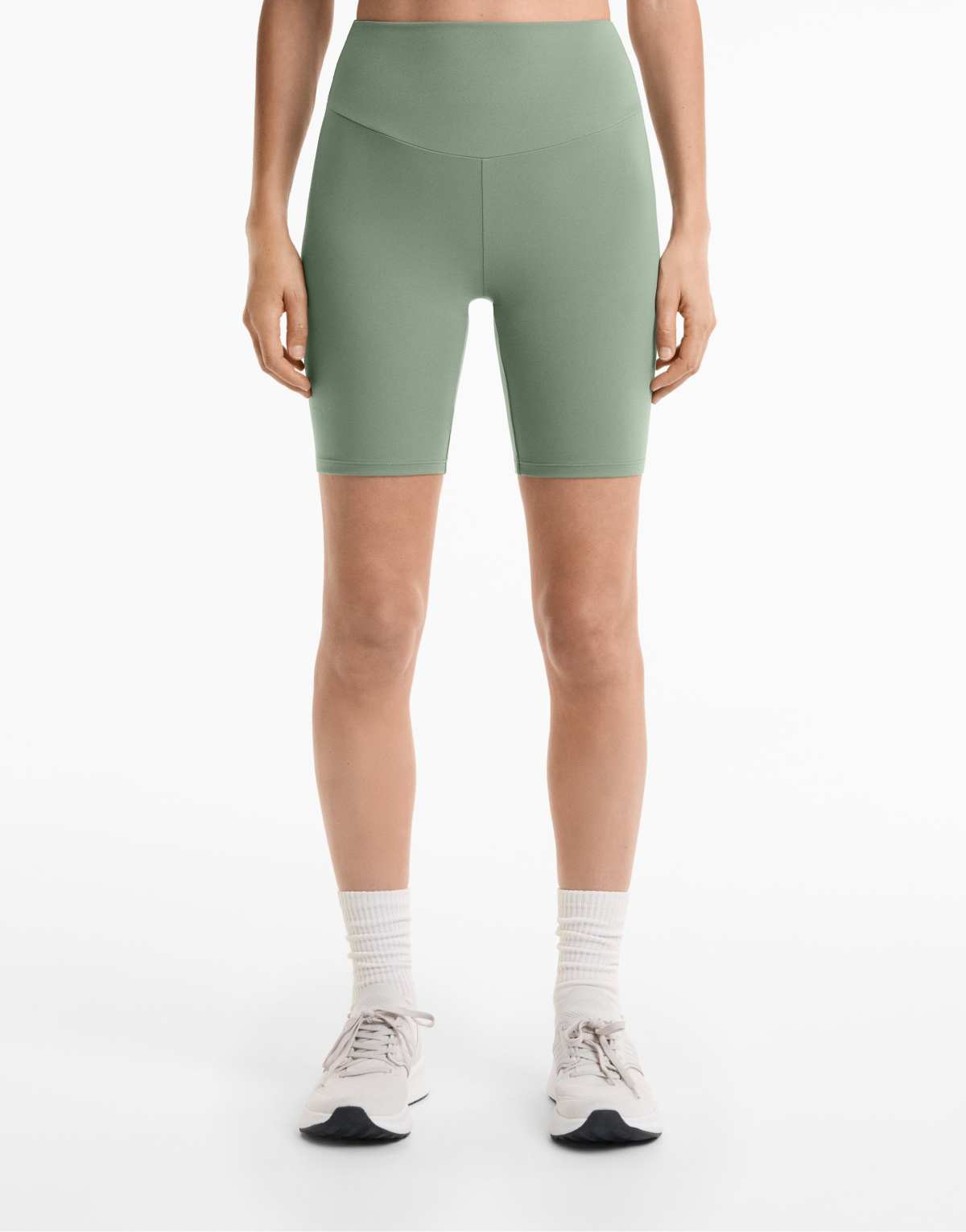 OYSHO Comfortlux high-rise 20cm biker leggings in green