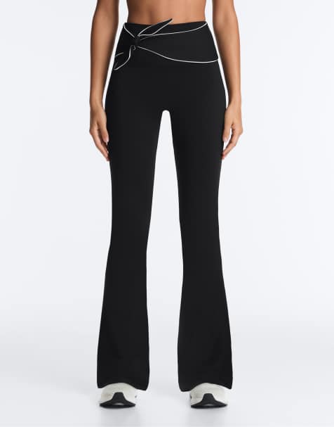 OYSHO Comfortlux high-rise flare trousers with bow in black - view 1