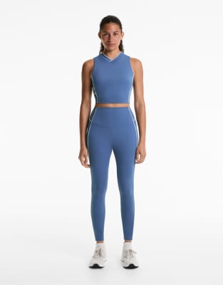OYSHO - Comfortlux - Knöchellange Leggings in Mittelblau mit hohem Bund und Paspelierung, 65 cm