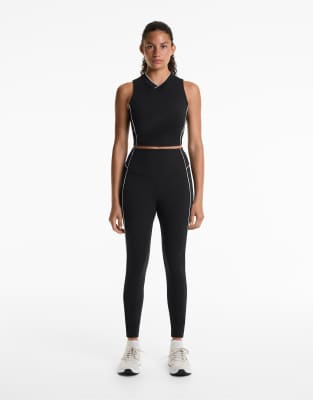 OYSHO - Comfortlux - Knöchellange Leggings in Schwarz mit hohem Bund und Paspelierung, 65 cm