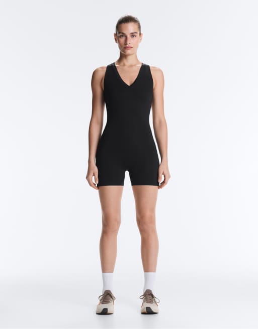 OYSHO - Comfortlux - Kort sort jumpsuit med åben ryg, 2 af 4