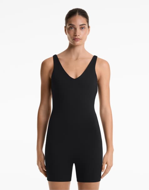 Oysho – Comfortlux – Kurzer Jumpsuit in Schwarz mit verdrehtem Detail - view 1