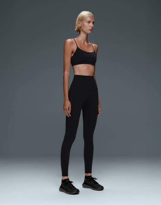 OYSHO Comfortlux light-support sports bra with crossover straps in black, 3 of 7