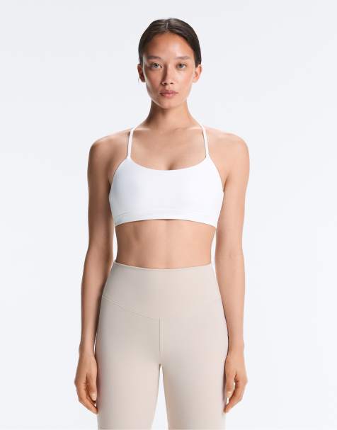 OYSHO Comfortlux light support sports bra with crossover straps in off-white - view 1