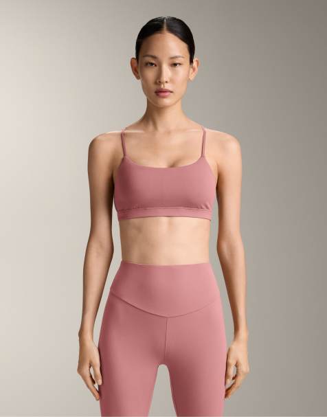 OYSHO Comfortlux light-support sports bra with crossover straps in pale pink