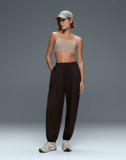 OYSHO Comfortlux light-support sports bra with crossover straps in stone, 3 of 7