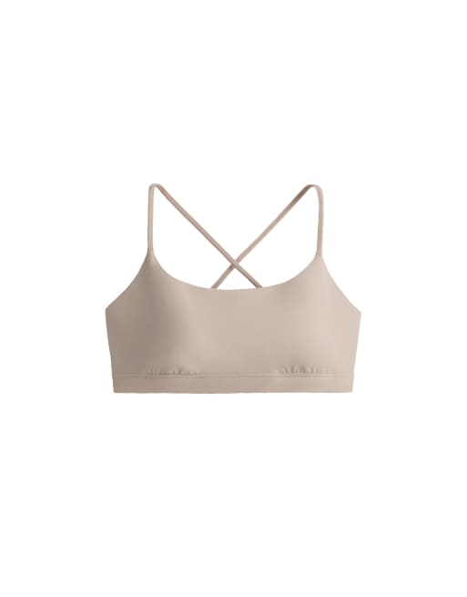 OYSHO Comfortlux light-support sports bra with crossover straps in stone, 7 of 7
