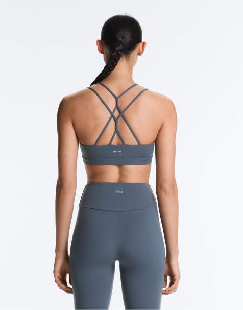 OYSHO - Comfortlux - Reggiseno sportivo a sostegno leggero blu petrolio con spalline incrociate - view 1