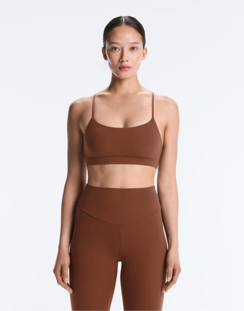 OYSHO - Comfortlux - Reggiseno sportivo a sostegno leggero color caffè con spalline incrociate - view 1