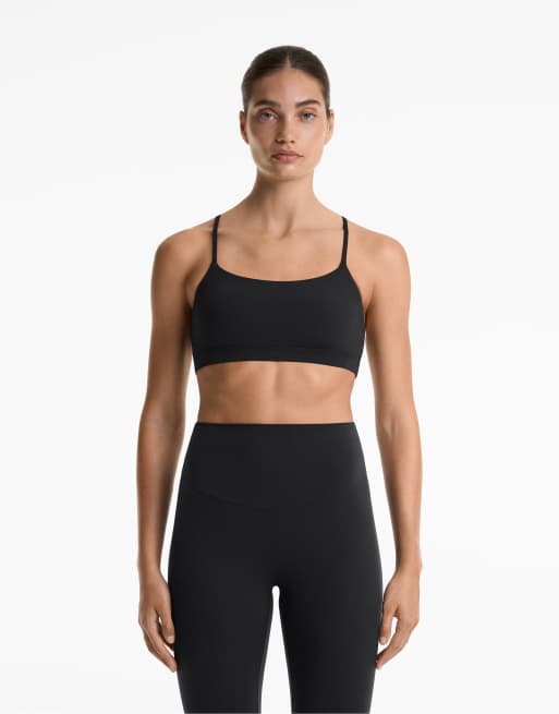 Oysho - Comfortlux - Reggiseno sportivo a sostegno leggero nero con spalline incrociate