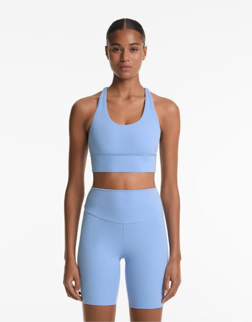 Oysho - Comfortlux - Reggiseno sportivo a sostegno medio color blu lavanda pallido con coppe