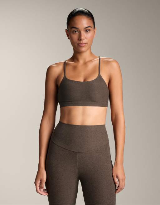 OYSHO - Comfortlux - Reggiseno sportivo a supporto leggero marrone con spalline incrociate