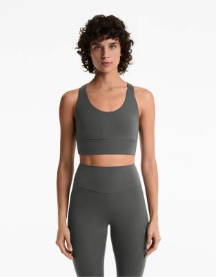 OYSHO - Comfortlux - Sport-BH in dunklem Anthrazit mit Körbchen und mittlerer Stützfunktion-Schwarz