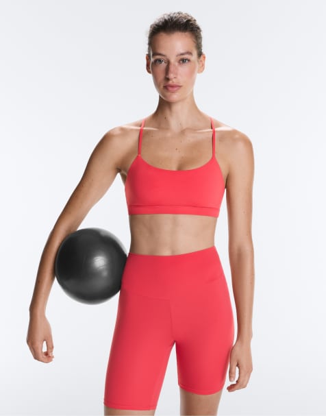 OYSHO Comfortlux sports-BH med let støtte og krydsede stropper i koral - view 1