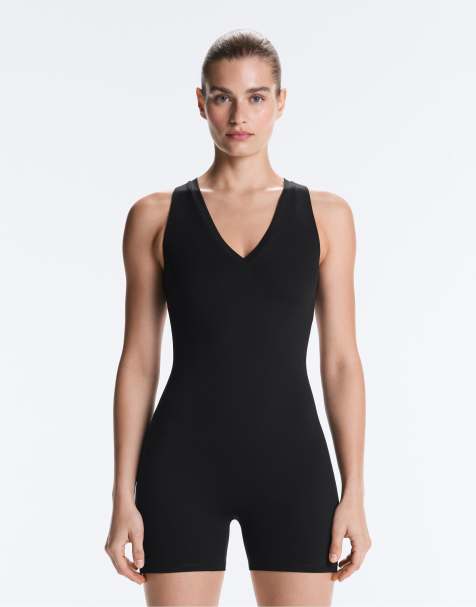 OYSHO – Comfortlux – Svart, kort jumpsuit med öppen rygg - view 1