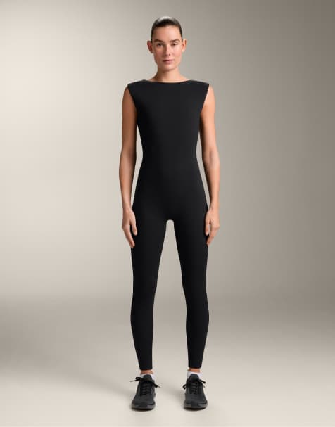 OYSHO – Comfortlux – Svart, lång jumpsuit med båtringning - view 1