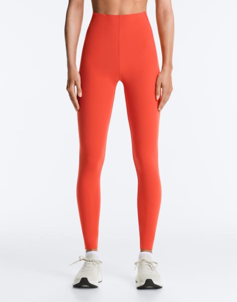 OYSHO Compressive core control ankle-length leggings in orange - view 1