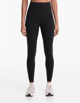 Oysho - Compressive Core Control - Knöchellange Leggings in Schwarz