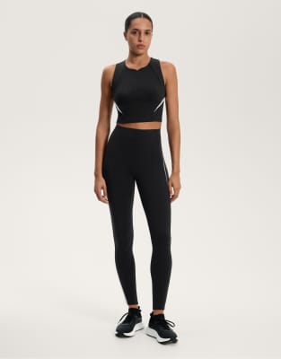 OYSHO - Compressive - Knöchellange Leggings in Schwarz mit seitlichen Streifen und hohem Bund, 65 cm Schrittlänge