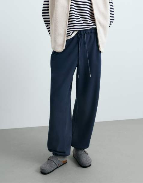OYSHO Cotton blend fleece straight-leg trousers in navy - view 1