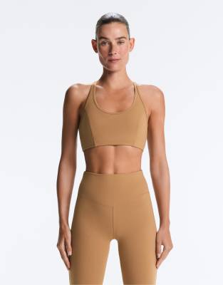 OYSHO Evermove medium-support sports bra in light brown