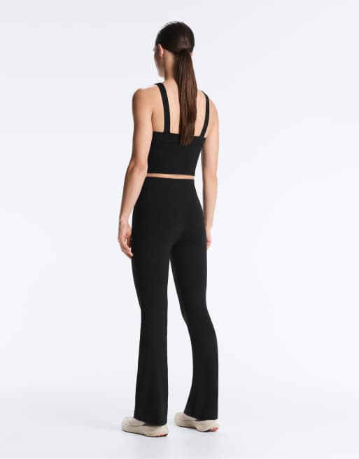 OYSHO - Evermove - Pantaloni a zampa neri a vita alta, 3 di 4
